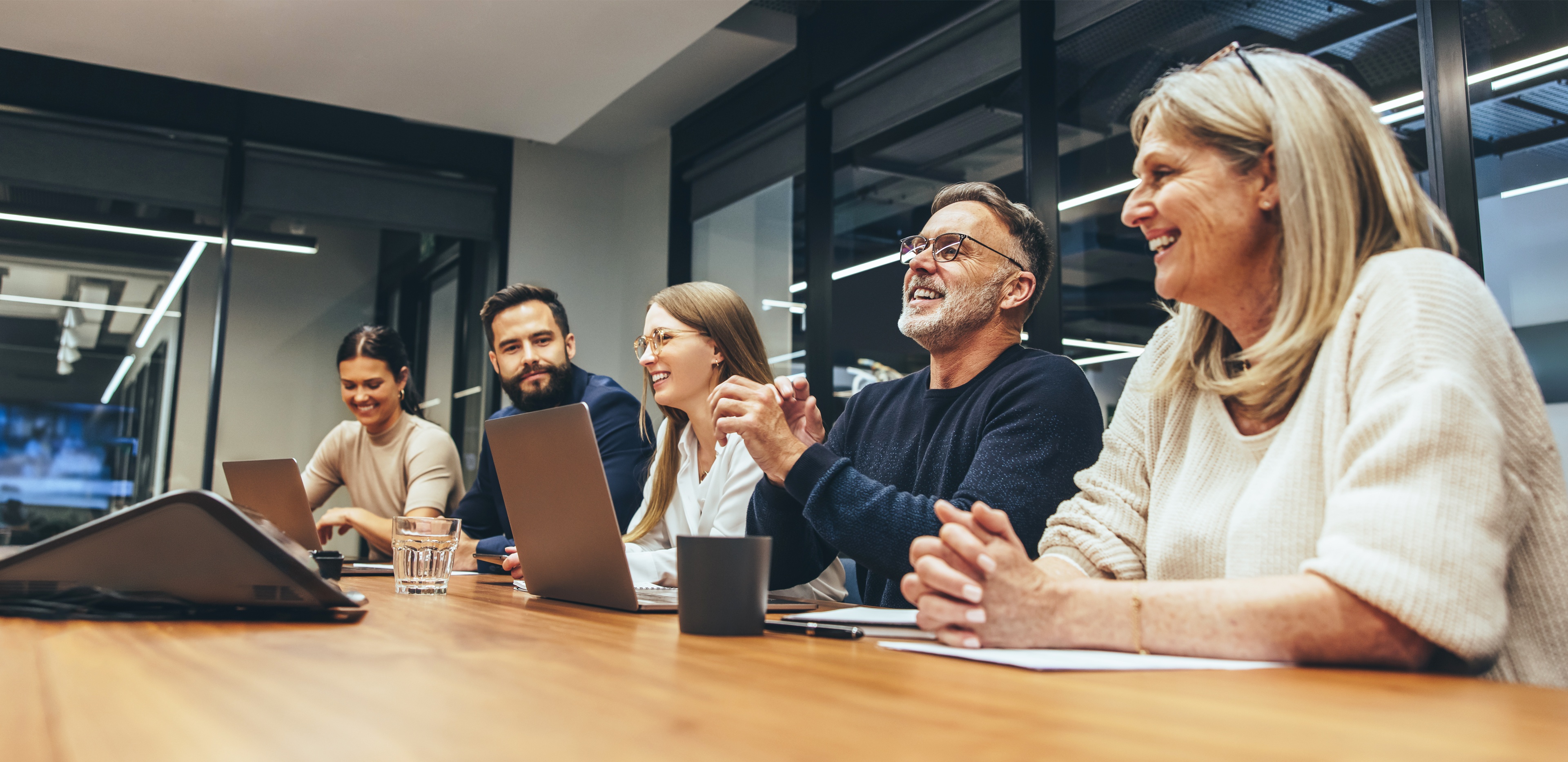 A work team sitting at a table A work team sitting at a table